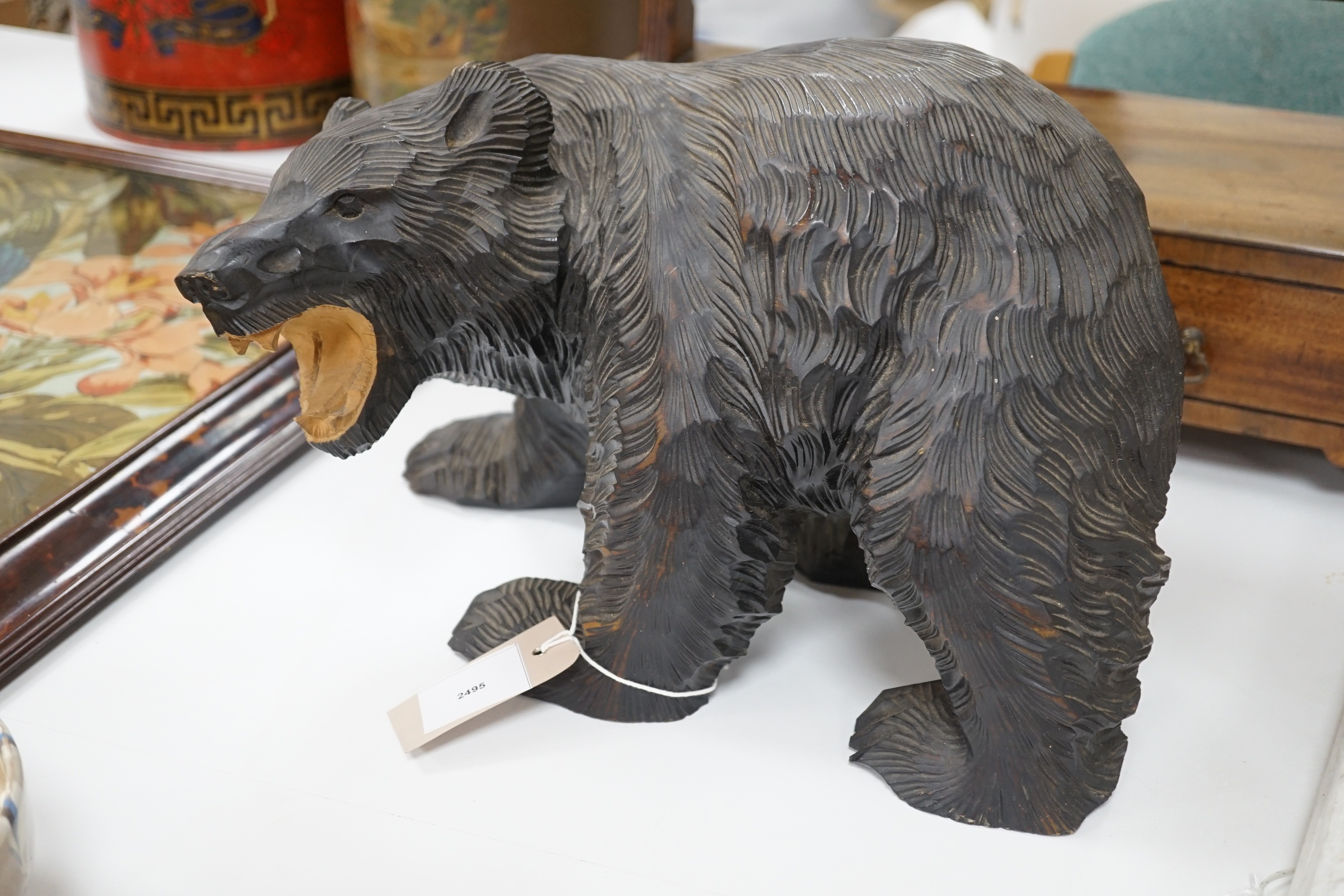 A Japanese carved wood bear, 35 cms wide